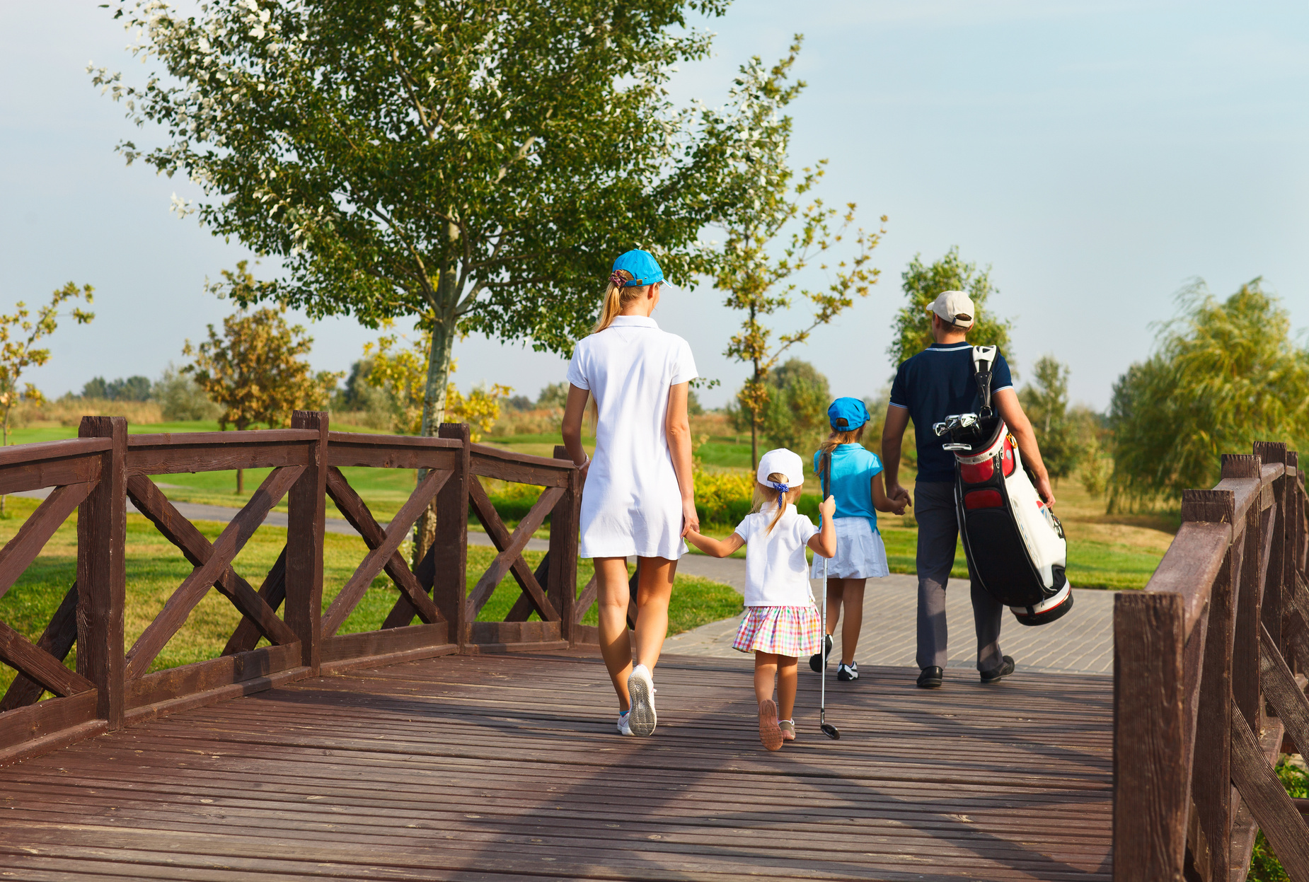 Happy Family in Golf Country Club