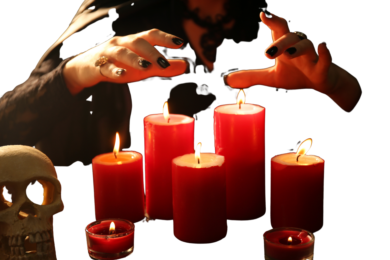 Woman's Hands Over Lit Candles